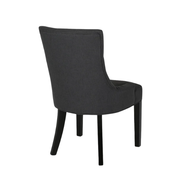Set of four dark charcoal grey upholstered dining chairs featuring diamond tufted backs, armless design, sloped sides, and espresso wood legs.