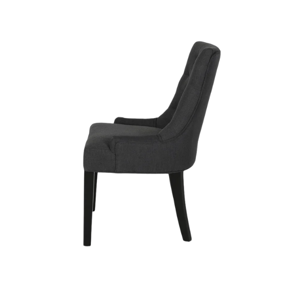 Set of four dark charcoal grey upholstered dining chairs featuring diamond tufted backs, armless design, sloped sides, and espresso wood legs.