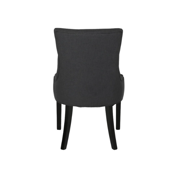 Set of four dark charcoal grey upholstered dining chairs featuring diamond tufted backs, armless design, sloped sides, and espresso wood legs.