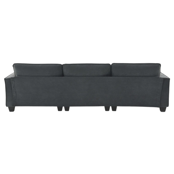 Charcoal grey suede L-shaped sectional sofa with tufted cushions, reversible chaise, removable ottoman, and two matching throw pillows