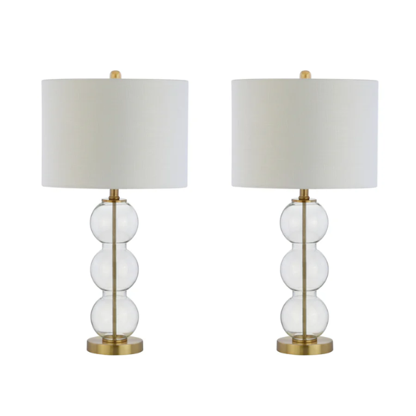 Set of 2 contemporary table lamps with clear glass triple-sphere base, gold accents, and white linen drum shade – modern glam bedside or living room lighting