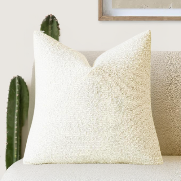 Cozy beige boucle throw pillow cover in modern solid design, made of polyester and acrylic blend, perfect for living room or bedroom decor.