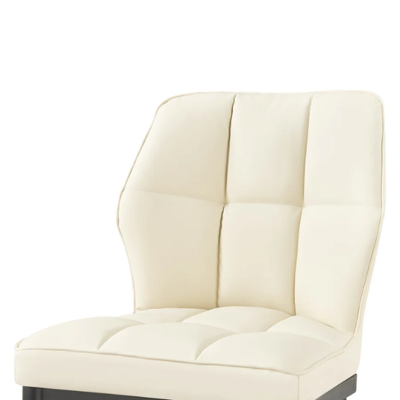 Set of two cream mid-century modern faux leather dining chairs with checkered stitching and metal legs