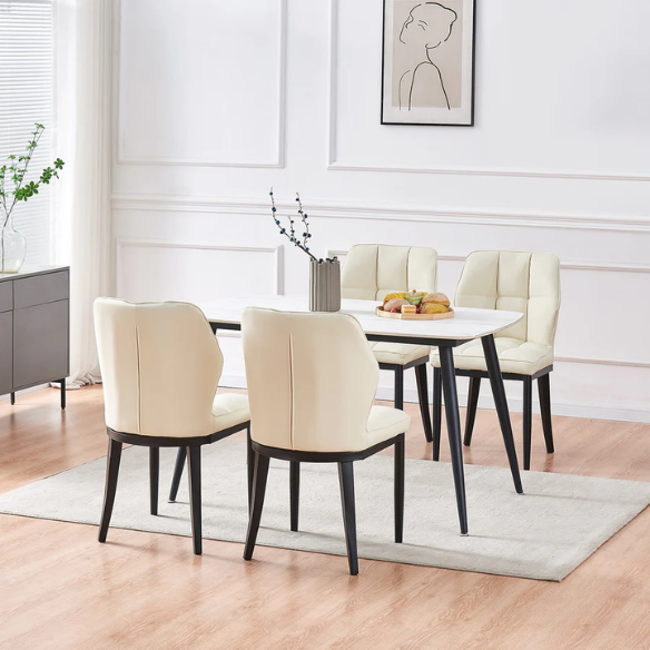 Set of two cream mid-century modern faux leather dining chairs with checkered stitching and metal legs