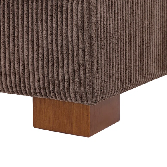 Dark brown corduroy convertible sleeper sofa with adjustable headrest, twin bed functionality, and mid-century wooden legs