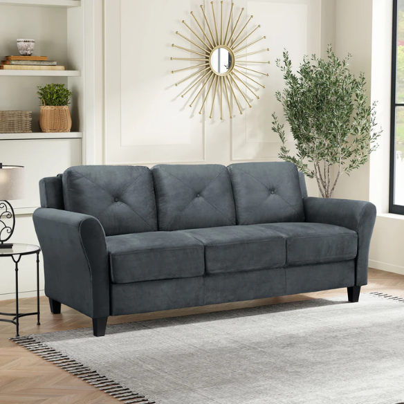 Modern 3-seater sofa upholstered in dark grey microfiber with tufted back cushions, flared arms, and a durable eucalyptus wood frame – ideal for contemporary or transitional living spaces