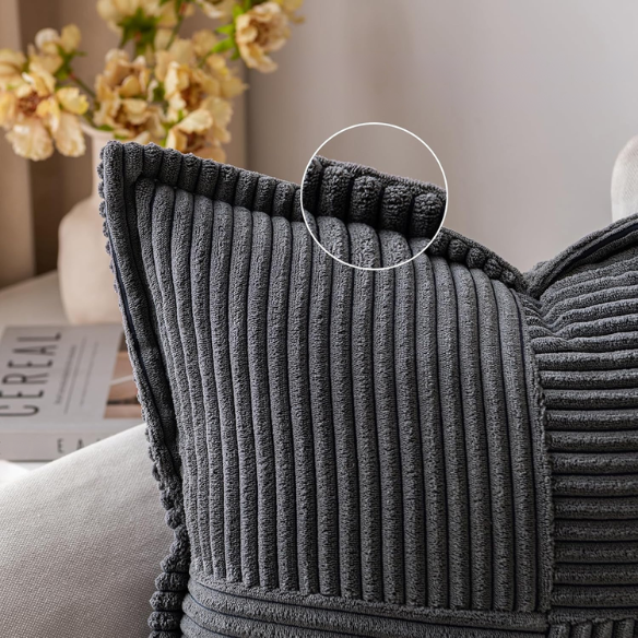 Dark grey corduroy pillow cover with geometric striped pattern, square shape, modern design, ideal for sofas, offices, and outdoor patios. Machine washable and eco-friendly.