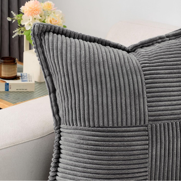 Dark grey corduroy pillow cover with geometric striped pattern, square shape, modern design, ideal for sofas, offices, and outdoor patios. Machine washable and eco-friendly.