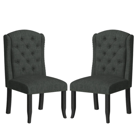 Set of two dark grey wingback farmhouse dining chairs with tufted backs, brass nailhead trim, and espresso-finished wooden legs