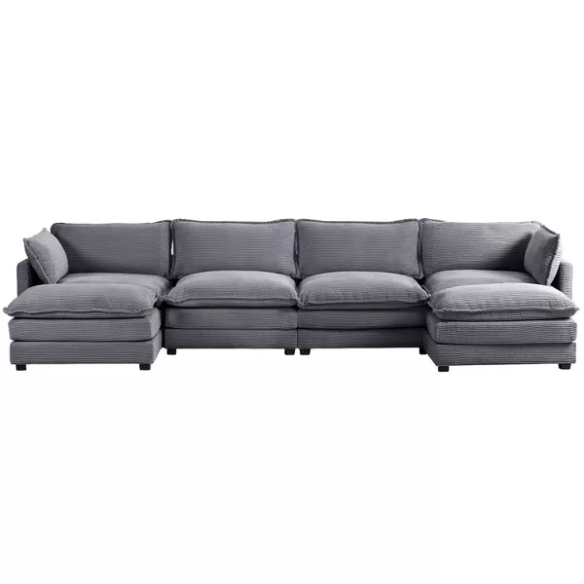 Dark grey 4-seat modular sectional sofa with two matching ottomans, upholstered in soft corduroy with high-resilience cushions and a sturdy wood and metal frame.