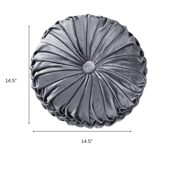 Dark grey velvet round throw pillows with hand-pleated design and button center, set of two 14.5-inch plush cushions styled in a modern living space.