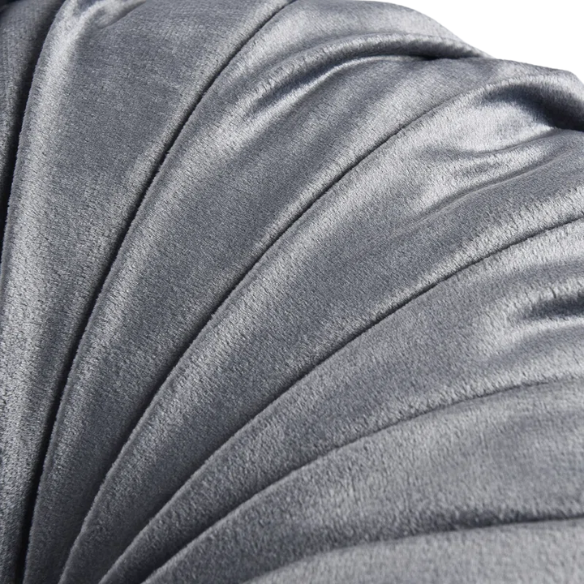 Dark grey velvet round throw pillows with hand-pleated design and button center, set of two 14.5-inch plush cushions styled in a modern living space.