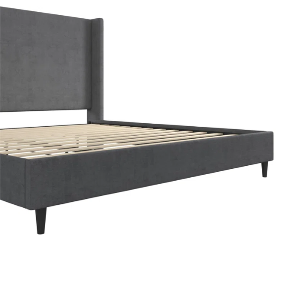 Dark grey soft woven upholstered king platform bed with tall wingback headboard and sturdy slat support.