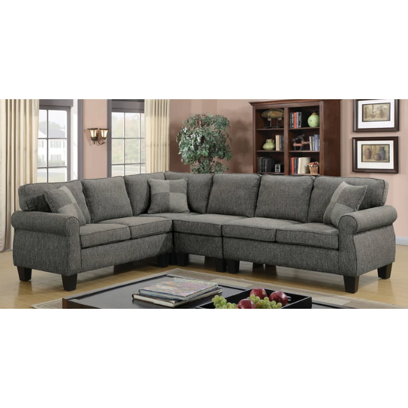 Dark grey transitional L-shaped sectional sofa with rolled arms, welt-trimmed cushions, and checkerboard accent pillows