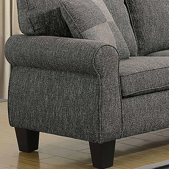 Dark grey transitional L-shaped sectional sofa with rolled arms, welt-trimmed cushions, and checkerboard accent pillows
