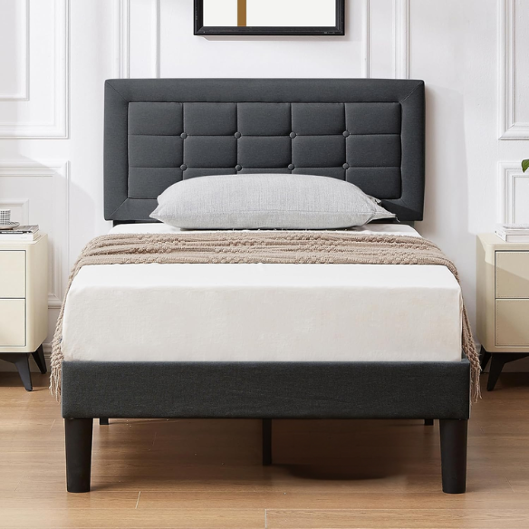 Dark gray twin upholstered platform bed frame with adjustable tufted linen headboard, sturdy metal and engineered wood construction, no box spring needed, and noise-resistant design.