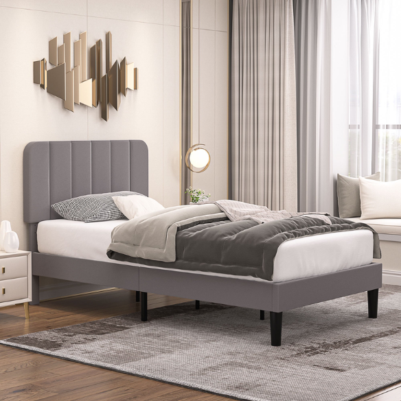 Dark grey twin upholstered platform bed with tufted headboard, metal and wood frame, under-bed storage, and adjustable height headboard.