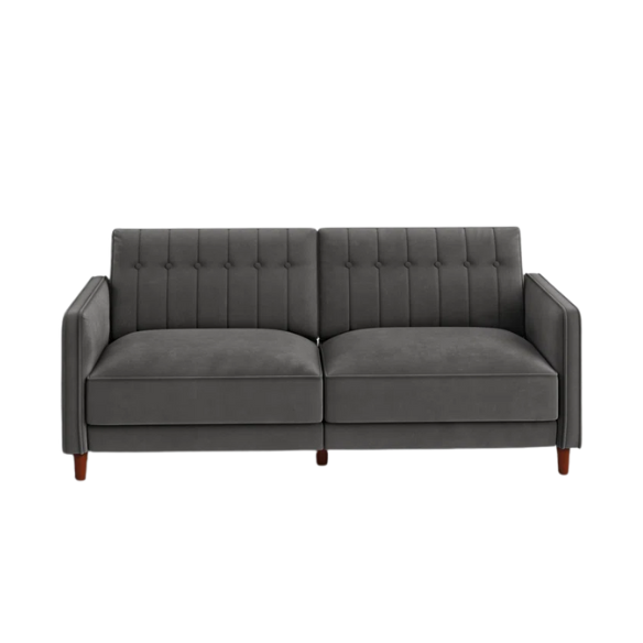 Dark grey velvet convertible sofa with vertical tufting, split-back design, square arms, and brown tapered legs, convertible into a twin-size sleeper.