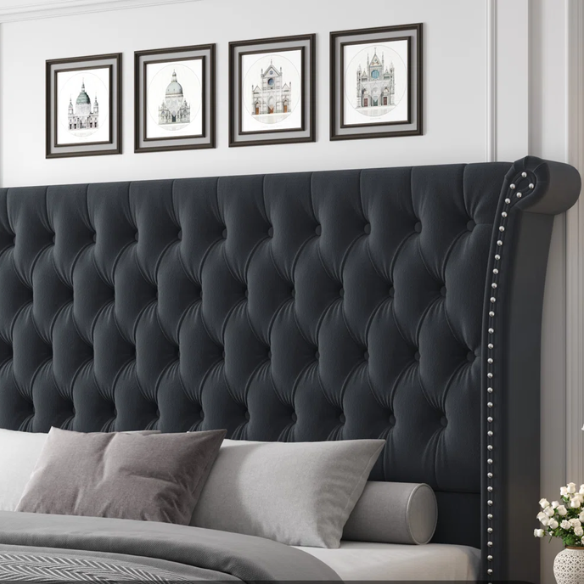 Dark grey velvet king-size platform bed with tall tufted wingback headboard, nailhead trim, and no box spring required