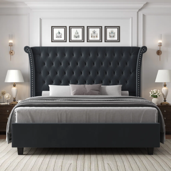 Dark grey velvet king-size platform bed with tall tufted wingback headboard, nailhead trim, and no box spring required