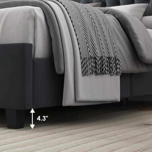 Dark grey velvet king-size platform bed with tall tufted wingback headboard, nailhead trim, and no box spring required