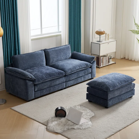 Deep blue chenille modular cloud sofa with plush foam cushions, pillow top arms, and a matching ottoman