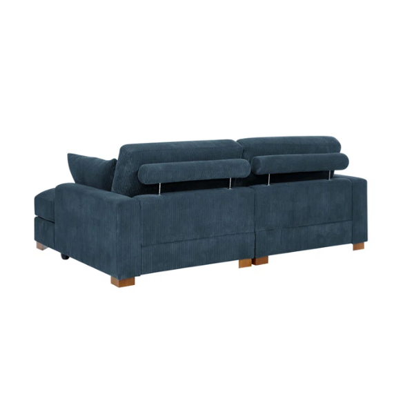 Deep blue corduroy convertible sleeper sofa with adjustable headrest, twin bed functionality, and mid-century wood legs