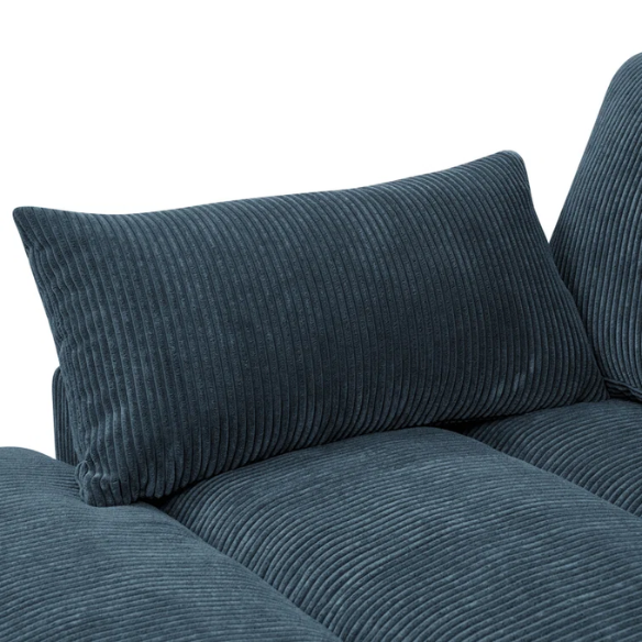 Deep blue corduroy convertible sleeper sofa with adjustable headrest, twin bed functionality, and mid-century wood legs