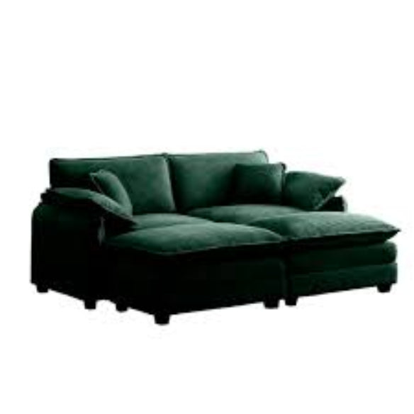 Modern emerald green ribbed velvet corduroy sofa with foam cushioning and pocket spring system, featuring a sturdy wood frame, plush back pillows, and sleek black plastic legs for superior comfort and stylish design.