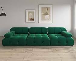 Modern emerald green velvet sectional sofa with plush upholstery, button tufting, and durable wood frame. Versatile design with individual seat cushions for ultimate comfort, supporting up to 330 lbs per seat. Perfect for living rooms, offering easy assembly and a sleek, contemporary style.