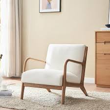 Sleek white accent chair with plush cushions and high-density sponge for optimal comfort. Made with a solid wood frame, it supports up to 250 lbs and includes footpads to protect floors. Ergonomically designed for lumbar support, it’s perfect for living rooms, bedrooms, or offices. Easy assembly and low maintenance with a simple wipe-down. Ideal for modern spaces seeking comfort and style.