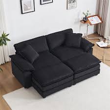 Modern black ribbed velvet corduroy sofa with foam cushioning and pocket spring system, featuring sturdy wood frame, plush back pillows, and sleek black plastic legs for ultimate comfort and style.
