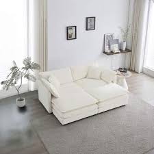 Luxurious cream beige velvet corduroy sofa with deep cushions, foam and pocket spring construction, sleek black plastic legs, offering sophisticated comfort and versatile style for modern living rooms, offices, and apartments.