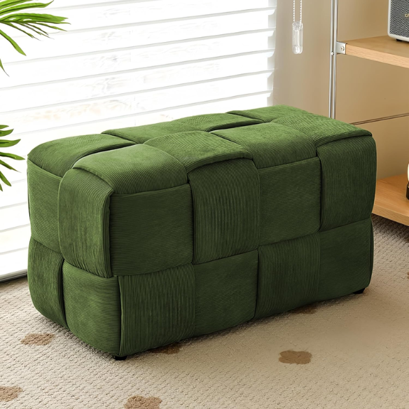 Forest green velvet ottoman with modern woven design, compact and versatile for home or office decor.