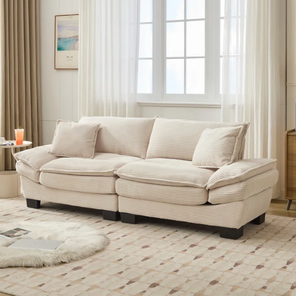 84-inch beige corduroy loveseat with striped upholstery, pillow-top arms, and two accent pillows—modern, low-profile design for living rooms or small spaces.