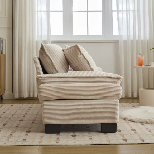 84-inch beige corduroy loveseat with striped upholstery, pillow-top arms, and two accent pillows—modern, low-profile design for living rooms or small spaces.