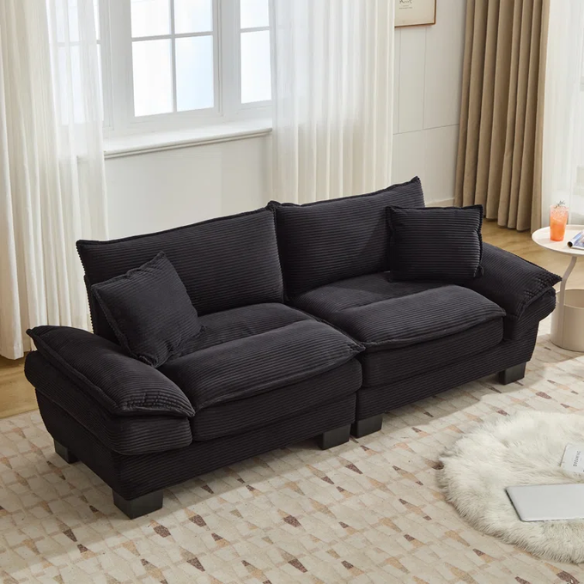84-inch black corduroy loveseat with striped upholstery, pillow-top arms, and two accent pillows—modern, low-profile design ideal for contemporary living rooms or compact spaces.