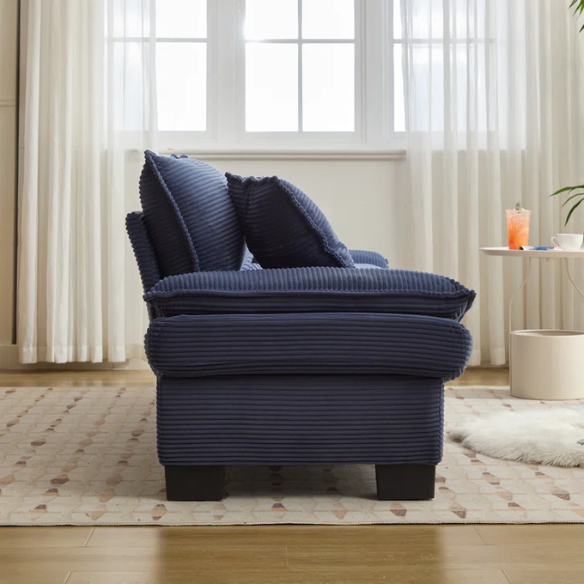 84-inch blue corduroy loveseat with striped upholstery, pillow-top arms, and two accent pillows—modern, low-profile design ideal for stylish living rooms or small spaces.