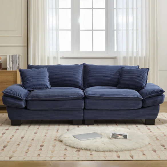 84-inch blue corduroy loveseat with striped upholstery, pillow-top arms, and two accent pillows—modern, low-profile design ideal for stylish living rooms or small spaces.