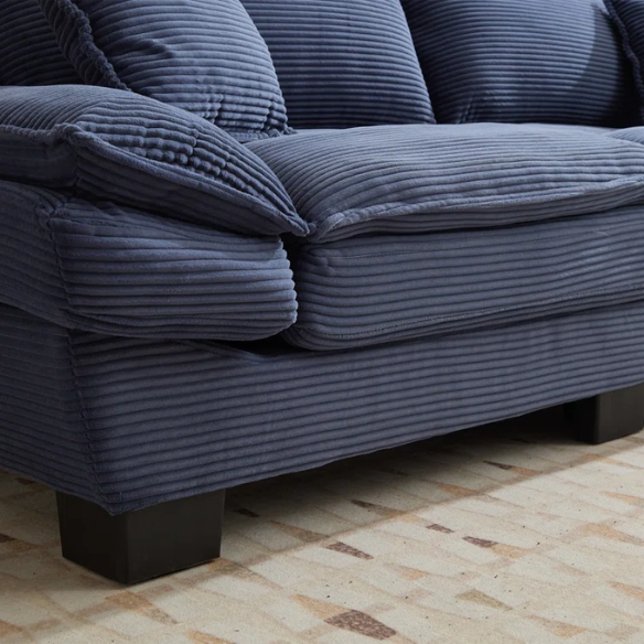 84-inch blue corduroy loveseat with striped upholstery, pillow-top arms, and two accent pillows—modern, low-profile design ideal for stylish living rooms or small spaces.