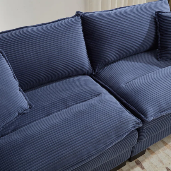 84-inch blue corduroy loveseat with striped upholstery, pillow-top arms, and two accent pillows—modern, low-profile design ideal for stylish living rooms or small spaces.