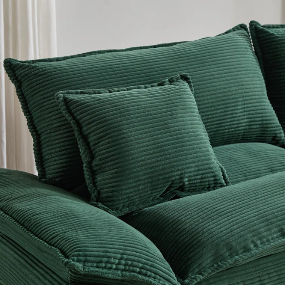 84-inch dark green corduroy loveseat with striped upholstery, pillow-top arms, and two accent pillows—modern, low-profile design ideal for stylish living rooms, offices, or apartments.