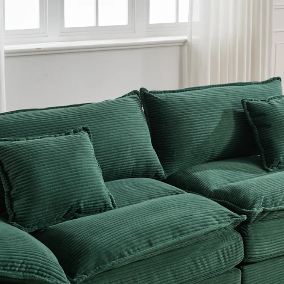 84-inch dark green corduroy loveseat with striped upholstery, pillow-top arms, and two accent pillows—modern, low-profile design ideal for stylish living rooms, offices, or apartments.