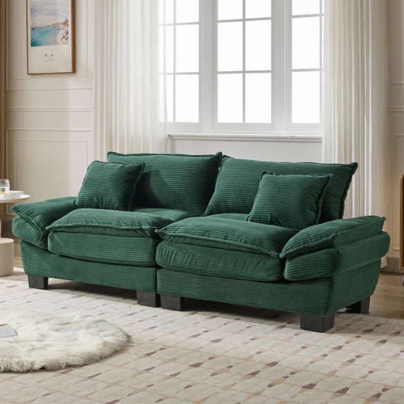 84-inch dark green corduroy loveseat with striped upholstery, pillow-top arms, and two accent pillows—modern, low-profile design ideal for stylish living rooms, offices, or apartments.