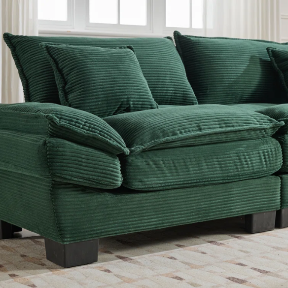 84-inch dark green corduroy loveseat with striped upholstery, pillow-top arms, and two accent pillows—modern, low-profile design ideal for stylish living rooms, offices, or apartments.