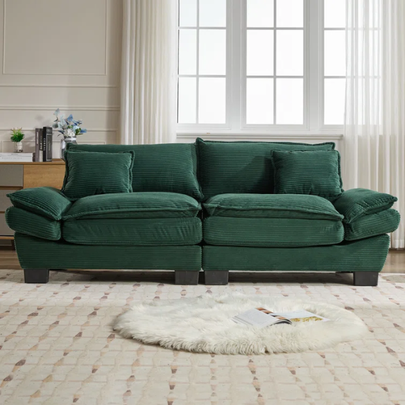 84-inch dark green corduroy loveseat with striped upholstery, pillow-top arms, and two accent pillows—modern, low-profile design ideal for stylish living rooms, offices, or apartments.