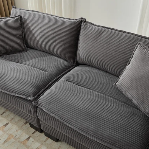 84-inch grey corduroy loveseat with striped upholstery, pillow-top arms, and two accent pillows—modern, low-profile design ideal for living rooms, apartments, or home offices.