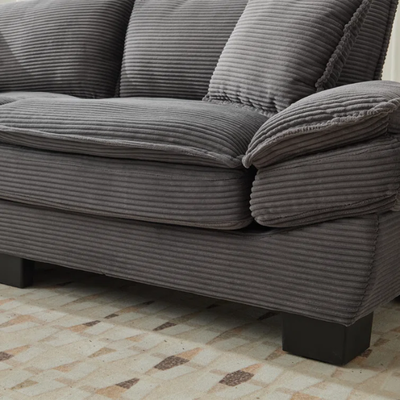 84-inch grey corduroy loveseat with striped upholstery, pillow-top arms, and two accent pillows—modern, low-profile design ideal for living rooms, apartments, or home offices.