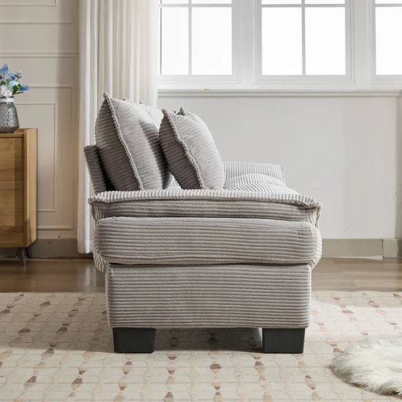 84-inch light grey corduroy loveseat with striped upholstery, pillow-top arms, and two accent pillows—modern, neutral-toned sofa ideal for living rooms, apartments, and minimalist spaces.