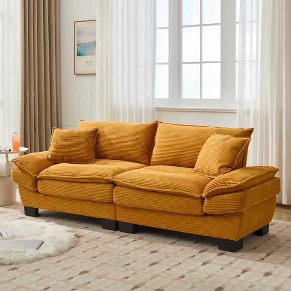 84-inch mustard yellow corduroy loveseat with striped upholstery, pillow-top arms, and two accent pillows—modern, low-profile design ideal for stylish living rooms, apartments, or creative spaces.